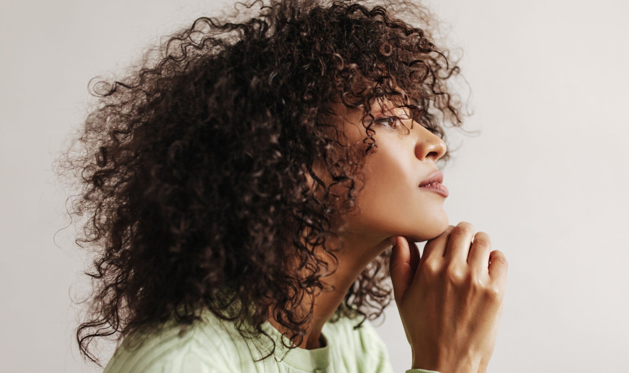 Santa Monica medspa model with curly hair